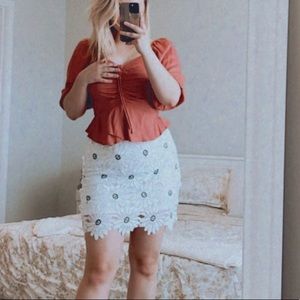 Daisy lace mini skirt